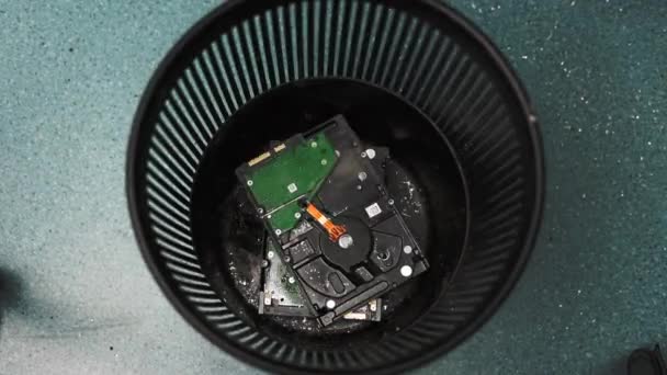 Person Throws Non Operating Hard Disk Drives Trash Bin Floor — Stock Video