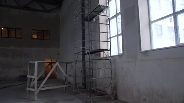 High Scaffolds Large Window Empty Plant Workshop Building Construction Site — Stock Video