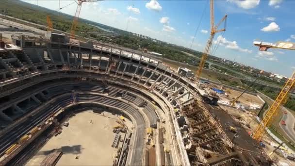 Oval Athletic Stadium Building Yellow Tower Cranes River Bank Modern — Stock Video