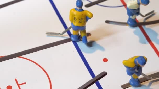 Tiny Hockey Players Figures Fight Puck Toy Ice Arena Tabletop — Stock Video