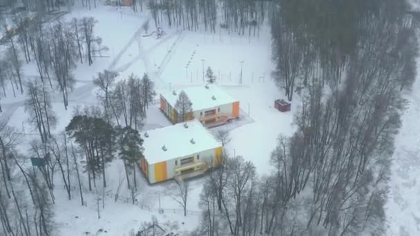 Athletic Base Colorful Buildings Forest Gloomy Winter Day Aerial View — Stock Video