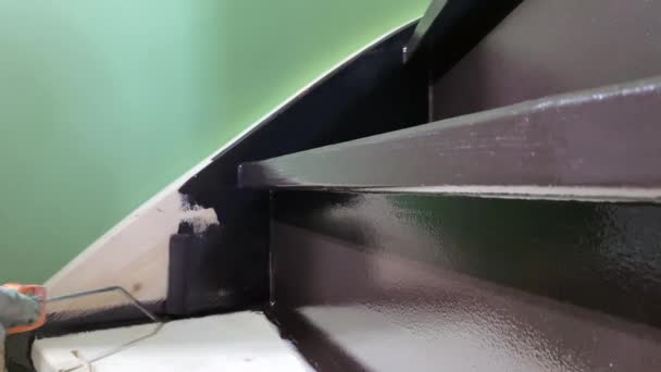Painter Paints Stairs Paint Roller — Stockvideo