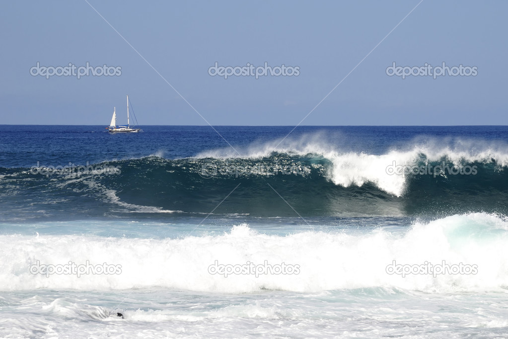 Sailboat and waves