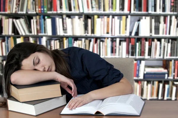 Sleeping on the books — Stock Photo, Image