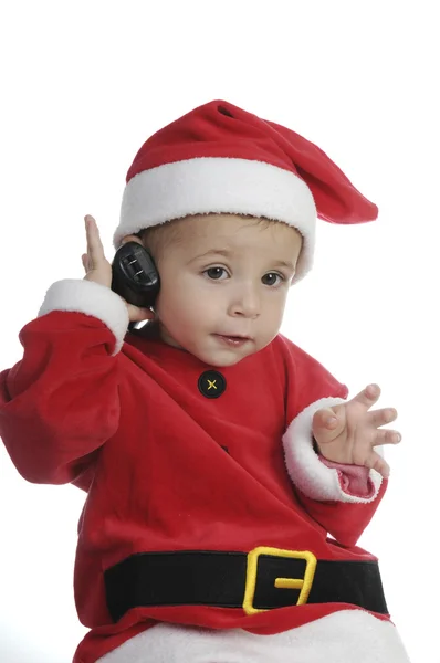 Little boy dressed as Santa Claus, and telephoning — Stock Photo, Image