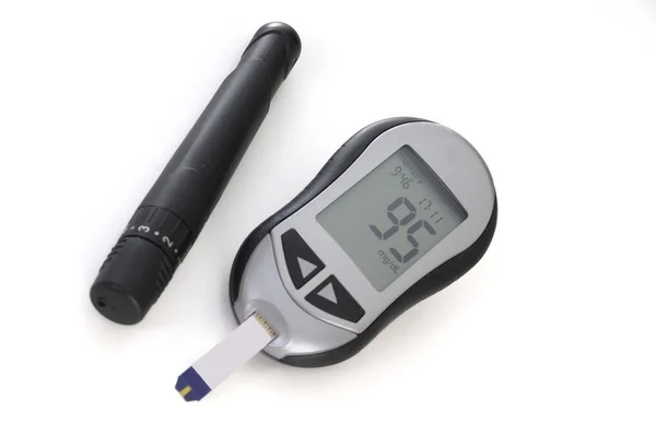 Glucometer, with a 95 reading displayed. Stock Picture