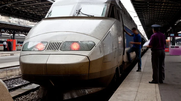 Passenger entering modern train — Stock Photo, Image