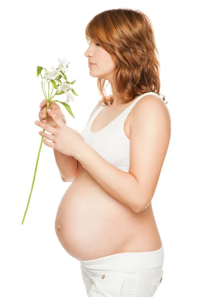 Abdomen de perfil de flor embarazada — Foto de Stock