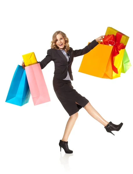 Happy shopping mall colorful bags surprised — Stock Photo, Image