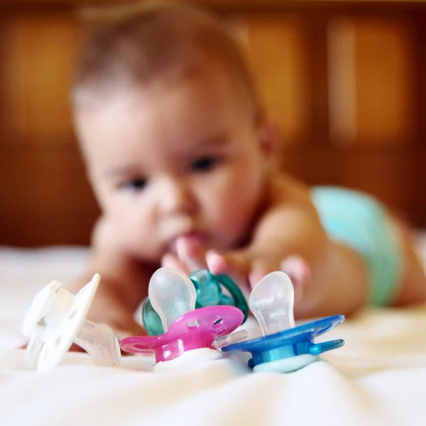 Baby and pacifier — Stock Photo, Image