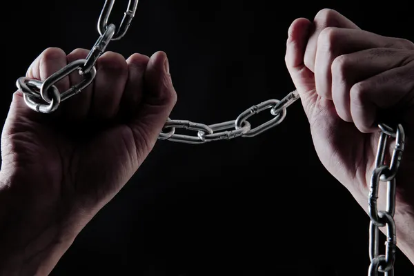 Human and chains — Stock Photo, Image