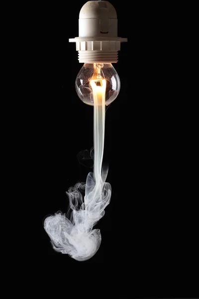Žárovka a oheň — Stock fotografie