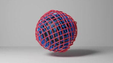 Beyaz bir zemin üzerinde kendi etrafında dönen soyut desenli top. 4k video.