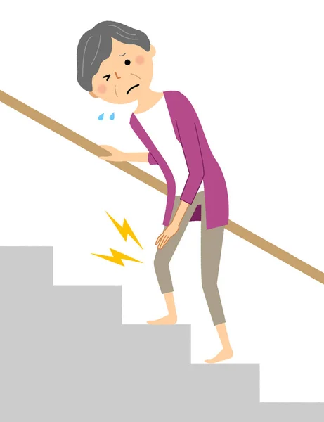 Üst düzey kadın merdivenleri tırmanıyor ve dizinde ağrı var. Üst kata çıkıp diz ağrısı çeken son sınıf bir kadının resmi..