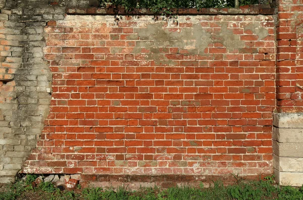 Stará cihlová zeď s červenými cihlami — Stock fotografie