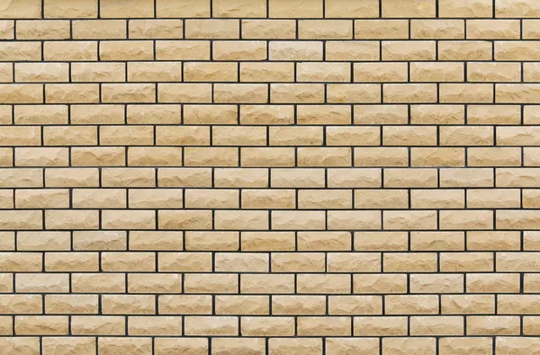 Yeni ve temiz sarı tuğla duvar 