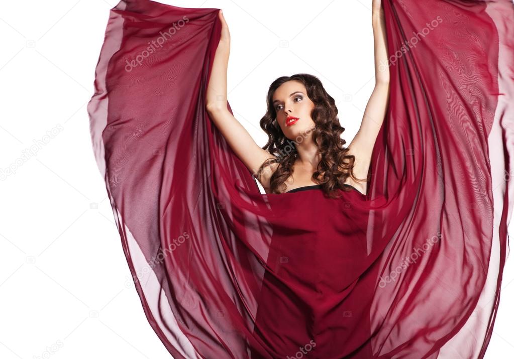 Woman in red dress flying on wind isolated