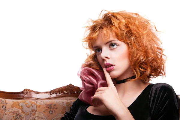 Girl with red hair making a hush gesture — Stock Photo, Image