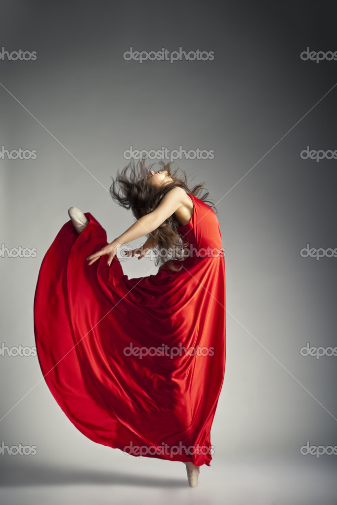 Ballet dancer wearing red dress over grey Stock Photo by ©Julenochek ...