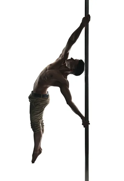 Junger starker Pole Dance Mann — Stockfoto