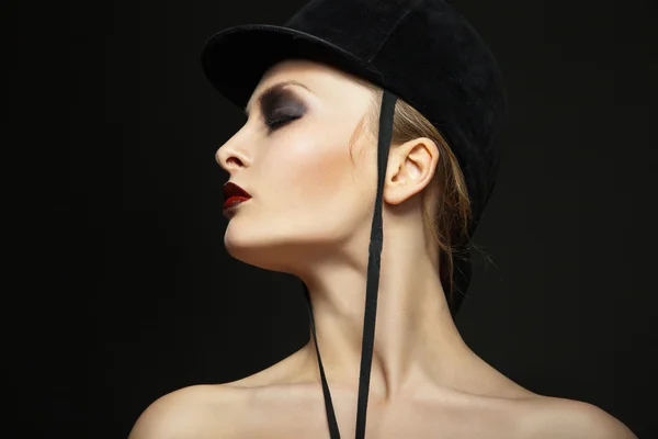 Fashion horsewoman wearing black hat — Stock Photo, Image