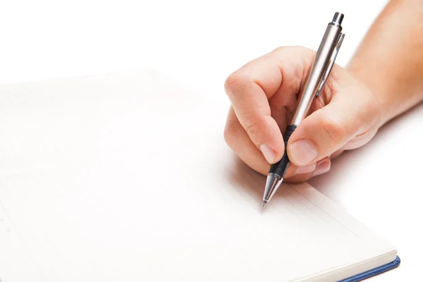 Hombre escritura a mano en libro abierto aislado en blanco —  Fotos de Stock