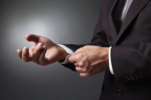 Close-up of elegance man hands with cufflink — Stock Photo, Image