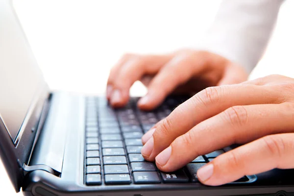 Businessman working on laptop over white — Stock Photo, Image