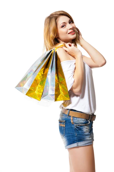 Heureuse femme souriante avec des sacs à provisions isolés — Photo