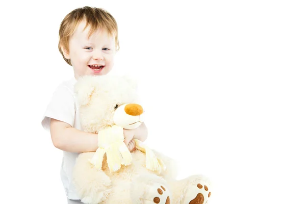 Cute funny infant baby girl with big toy bear — Stock Photo, Image