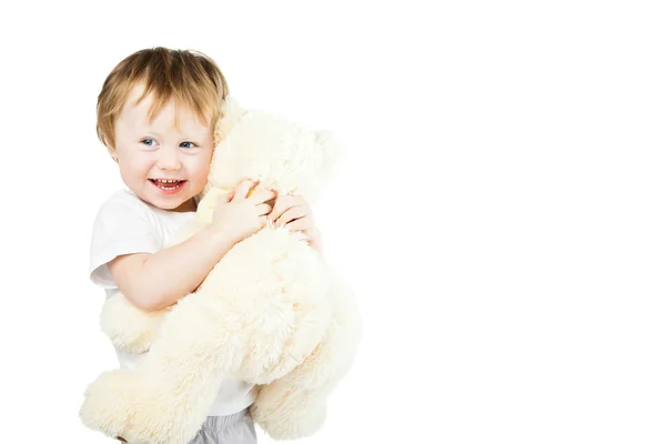 Roztomilý zábavná kojenecká holčička s velkými hračka medvěd — Stock fotografie