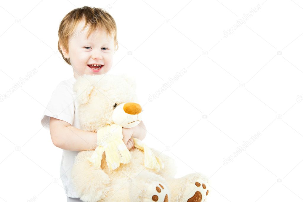 Cute funny infant baby girl with big toy bear