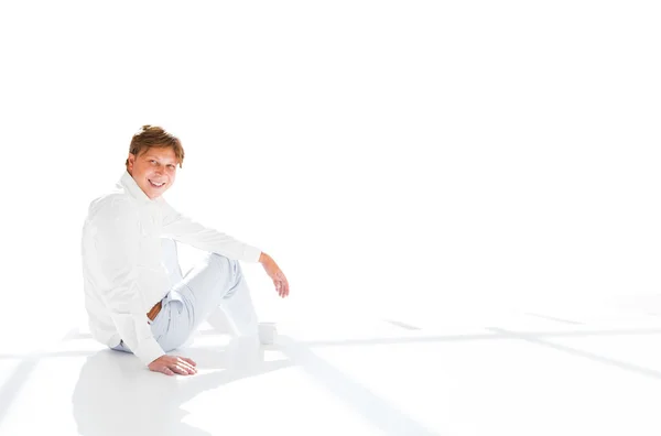 Attractive man and inviting someone to have a tea — Stock Photo, Image