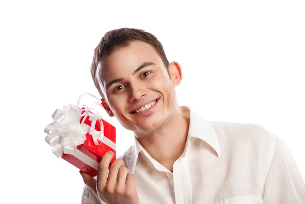 Close-up sorrindo homem segurando dom isolado — Fotografia de Stock