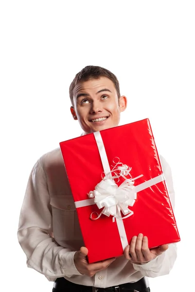 Uomo sorridente in possesso di dono isolato su bianco — Foto Stock