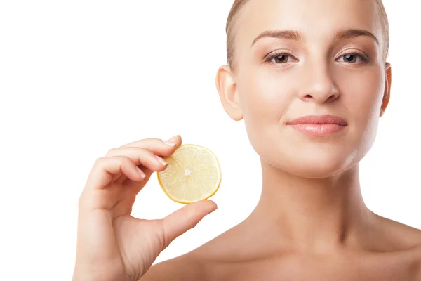 Young beautiful woman with lemon over white — Stock Photo, Image