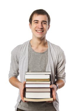 bir yığın kitap taşıyan adam