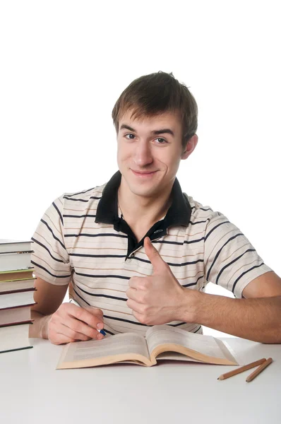 Student with pile of books — Stock Photo, Image