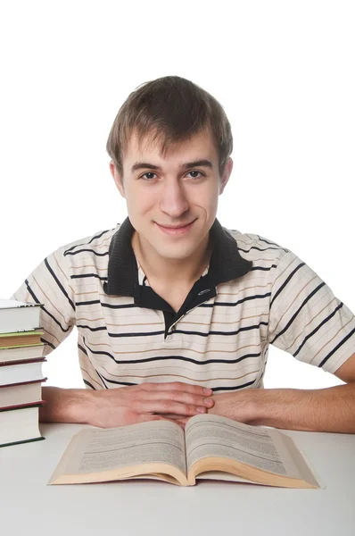 Student met stapel boeken — Stockfoto