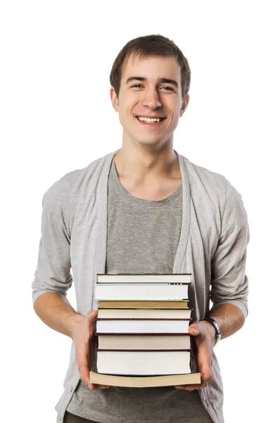Mann trägt einen Stapel Bücher — Stockfoto