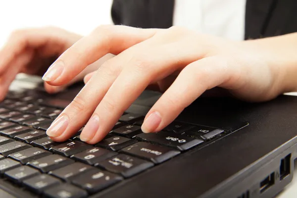 Woman hands typing on laptot, close-up, isolated — Stock Photo, Image