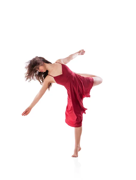 穿件红色的连衣裙，孤立的年轻的芭蕾舞演员 — 图库照片