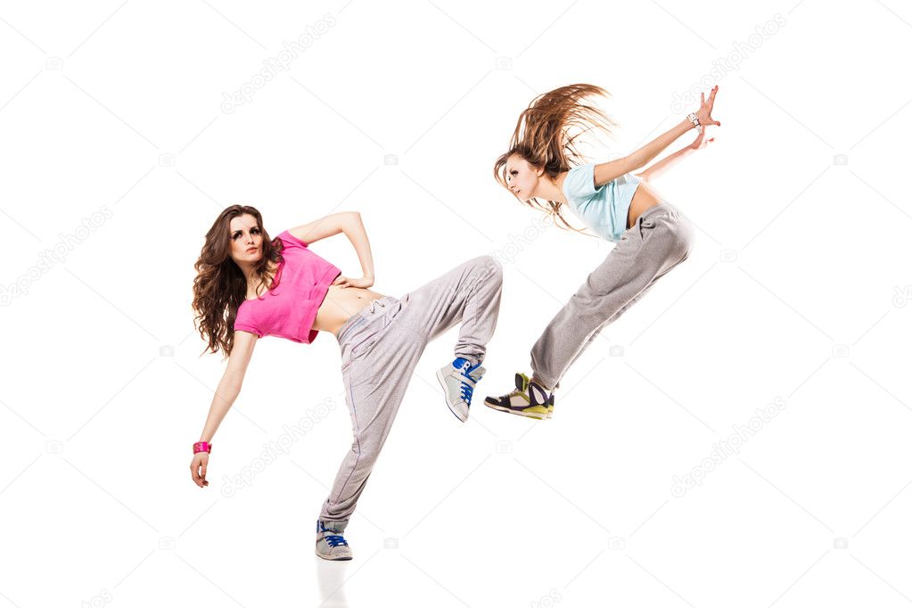 Cool looking two dancing women on white background