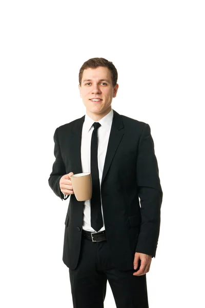 Young businessman with cup of coffee — Stock Photo, Image