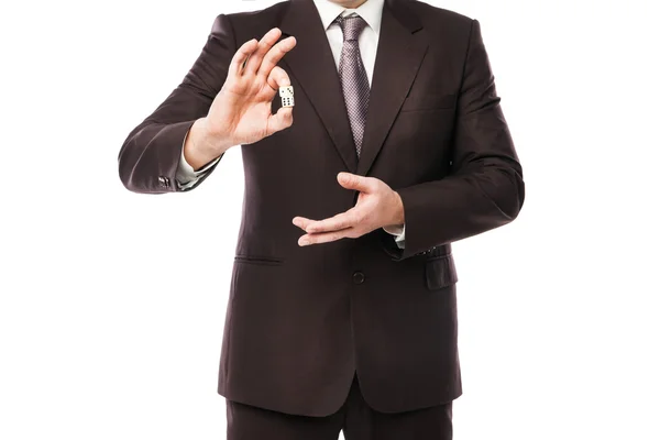 Empresário jogando dados isolados em branco — Fotografia de Stock