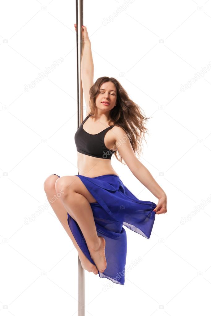 Young sexy woman exercise pole dance against white