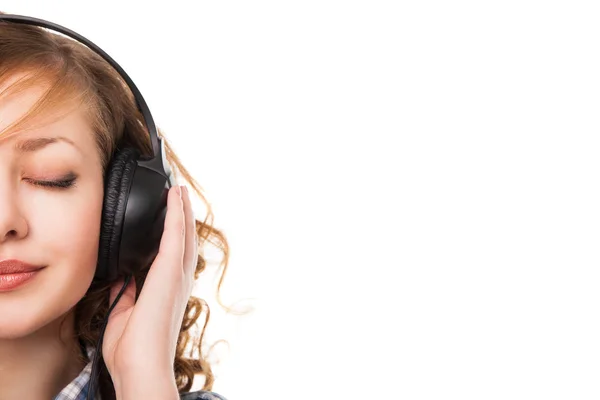 Woman with headphones listening music Stock Photo