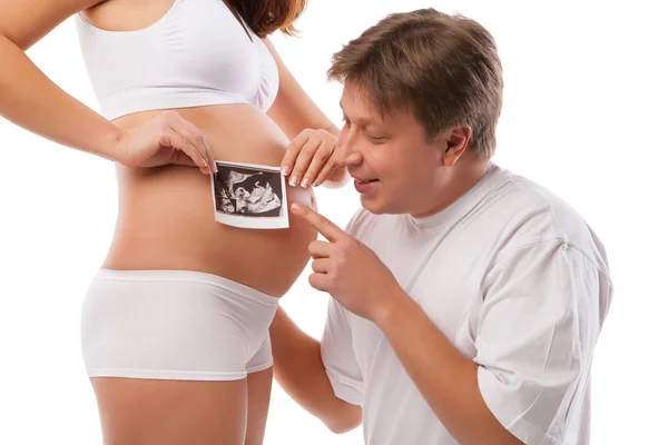 Mulher grávida e marido está segurando Ultrassom — Fotografia de Stock