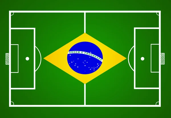 Футбольное поле с флагом Бразилии — стоковое фото