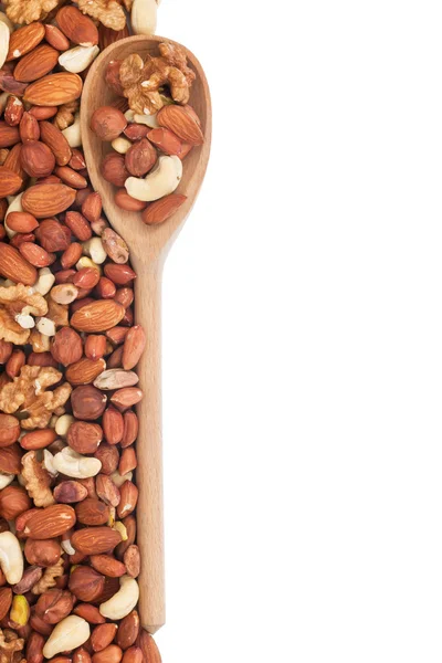 Wooden spoon with nuts — Stock Photo, Image